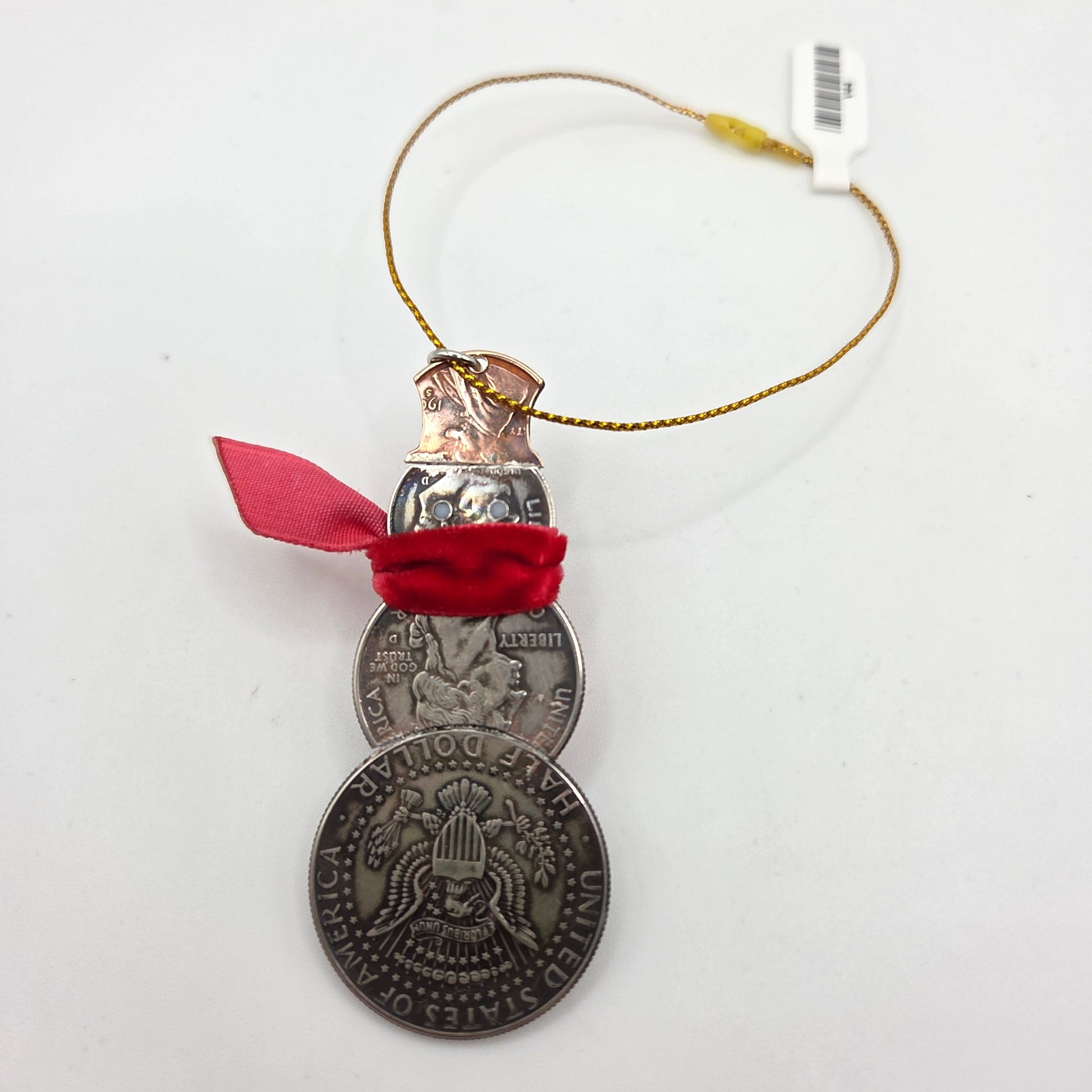 2025 Snowman Coin Christmas Ornament with a selection of U.S. coins (penny, dime, state quarter, and 2025 uncirculated half dollar) soldered into a snowman with a red ribbon scarf and golden tassel on a white background. - Mountainstruck Coin Jewelry