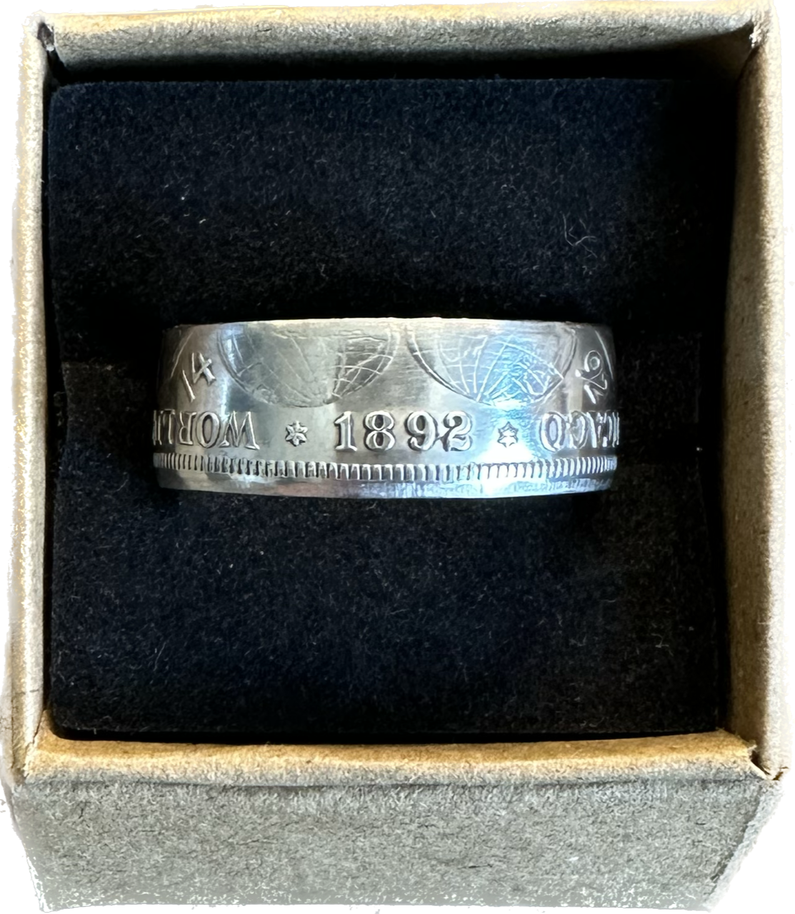 1892-1893 Chicago Columbus Silver Half Dollar Coin Ring (shine) in a brown kraft box on a black velvet background. - Mountainstruck Coin Jewelry