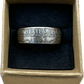 "A Nation of Immigrants" Half Dollar Coin Ring patina in a brown kraft box on a black velvet background. - Mountainstruck Coin Jewelry