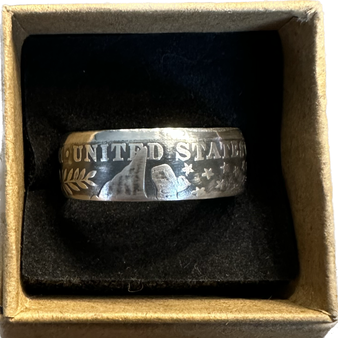 Barber Half Dollar Silver Coin Ring (reverse) in brown kraft box on a black velvet background. - Mountainstruck Coin Jewelry