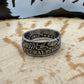 Barber Half Dollar Silver Coin Ring (reverse) on a wood background. - Mountainstruck Coin Jewelry