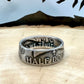 Ben Franklin Half Dollar Silver Coin Ring on a light wood round with a metal mountain background. - Mountainstruck Coin Jewelry