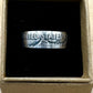 Ben Franklin Half Dollar Silver Coin Ring in a brown kraft box on a black velvet background. - Mountainstruck Coin Jewelry