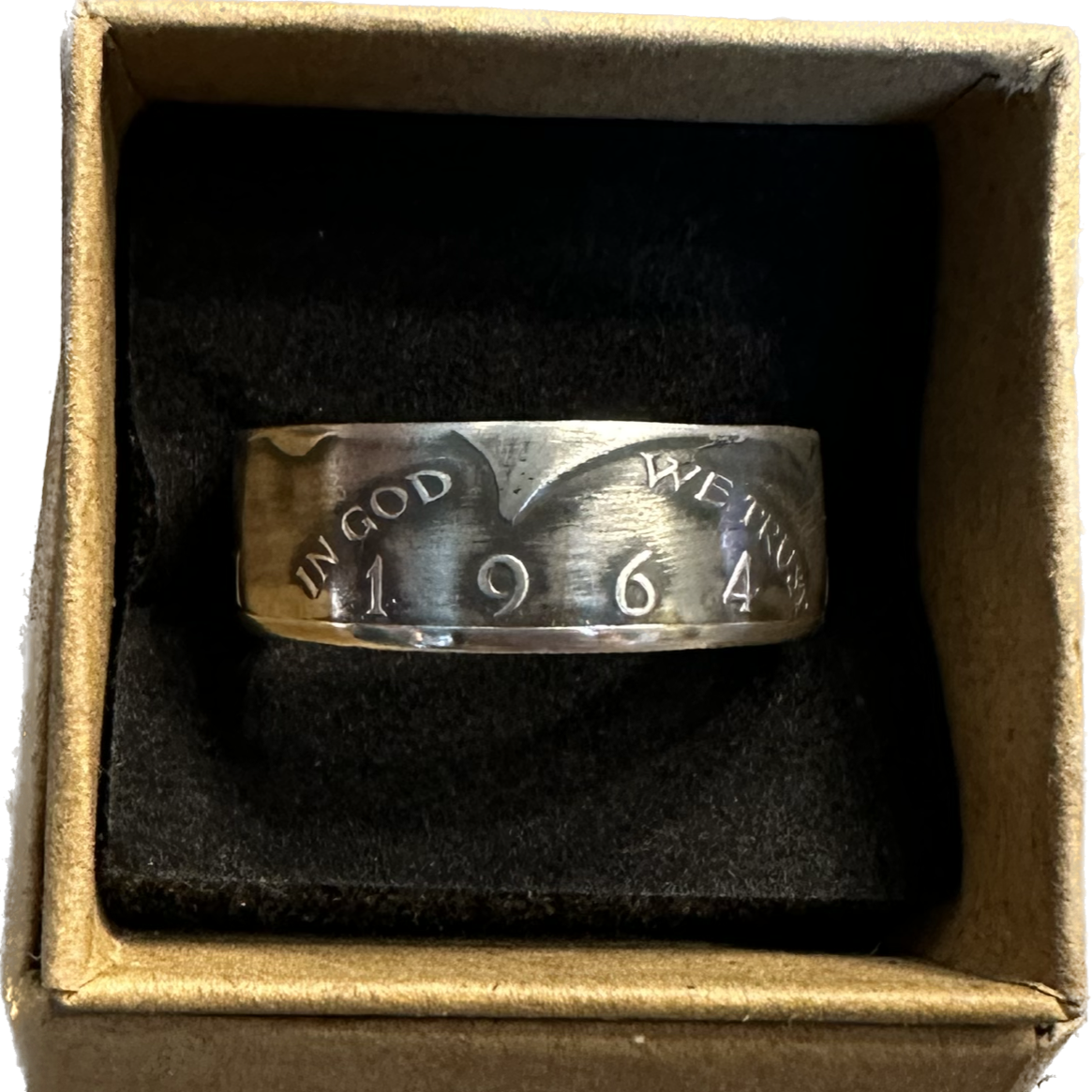 JFK 1964 Half Dollar Silver Coin Ring in a brown kraft box on a black velvet background. - Mountainstruck Coin Jewelry