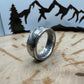 JFK 1964 Half Dollar Silver Coin Ring on a wood background. - Mountainstruck Coin Jewelry