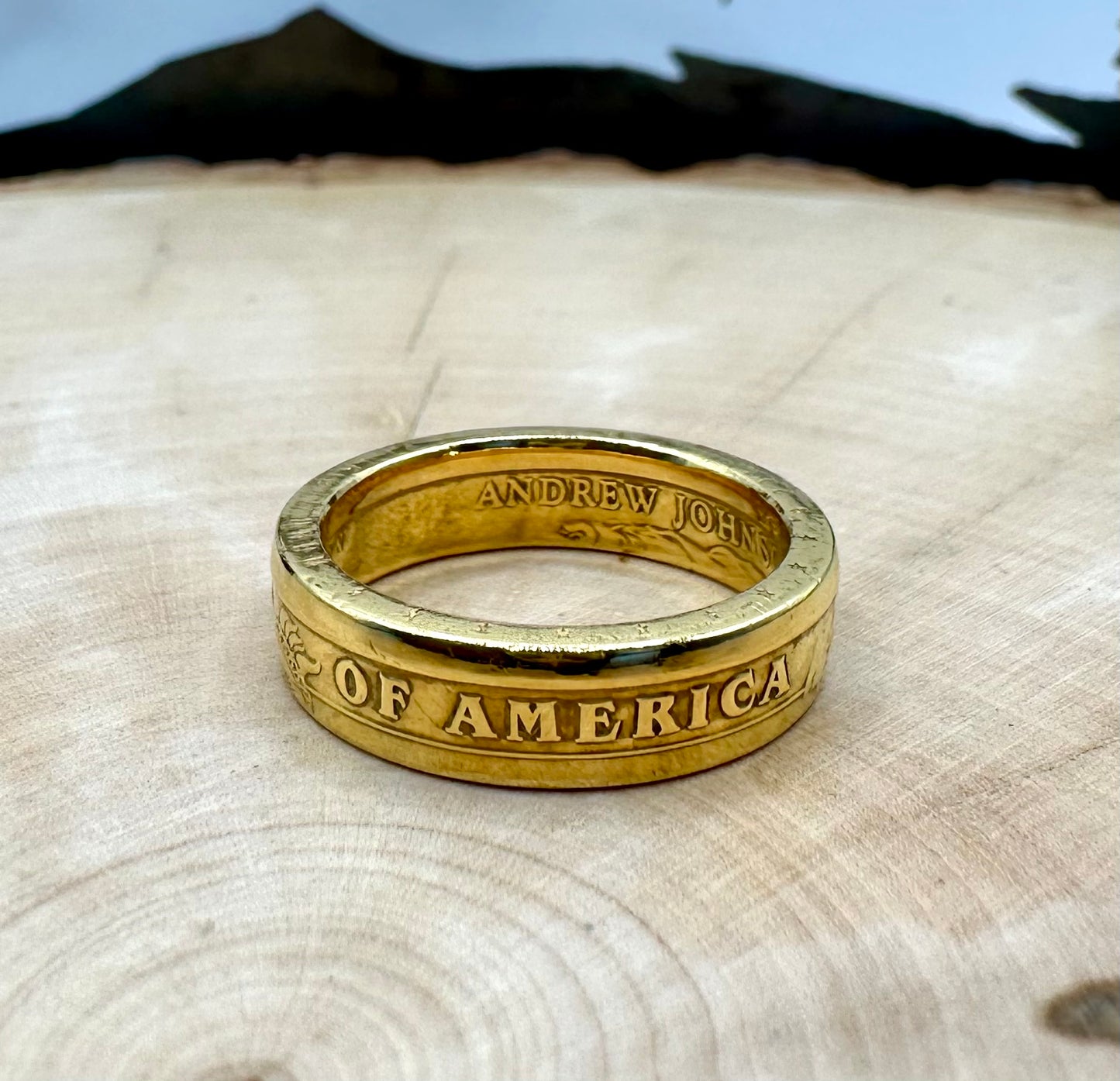 Presidential Dollar Coin Ring (Reverse) 24k Gold Plated on a light wood round with a metal mountain background. - Mountainstruck Coin Jewelry