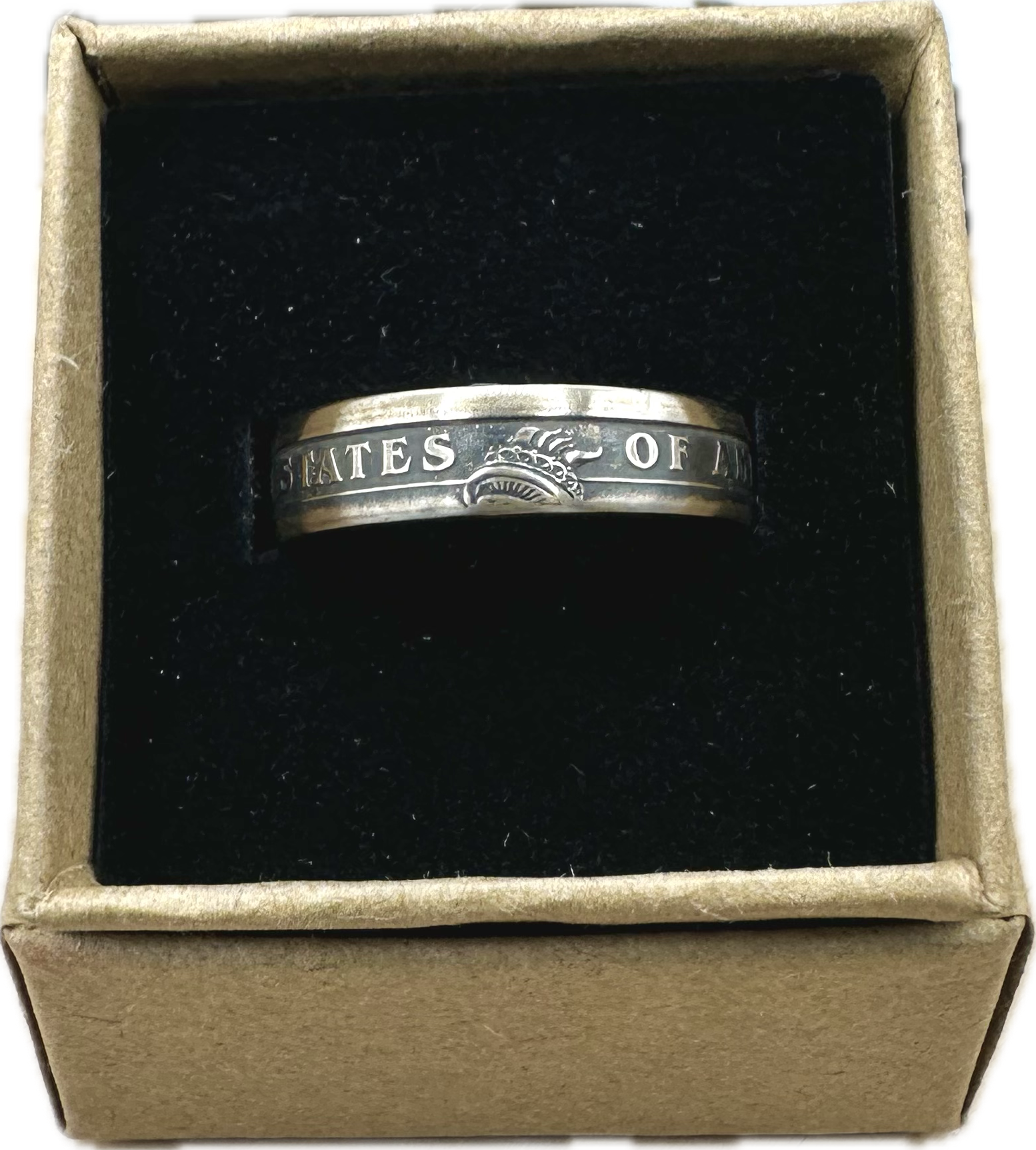 Presidential Dollar Coin Ring (Reverse) patina in a brown kraft box on a black velvet background. - Mountainstruck Coin Jewelry