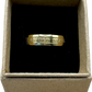 Presidential Dollar Coin Ring (Reverse) 24k Gold Plated in a brown kraft box on a black velvet background. - Mountainstruck Coin Jewelry