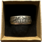 (Rare) Capped Bust Liberty Silver Half Dollar Coin Ring in a brown kraft box on a black velvet background. - Mountainstruck Coin Jewelry