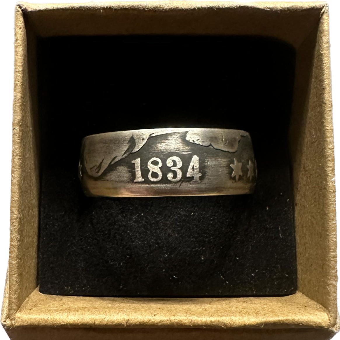 (Rare) Capped Bust Liberty Silver Half Dollar Coin Ring in a brown kraft box on a black velvet background. - Mountainstruck Coin Jewelry