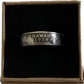 U.S. State Quarter Coin Ring featuring Hawaii patina in a brown kraft box on a black velvet background.  - Mountainstruck Coin Jewelry
