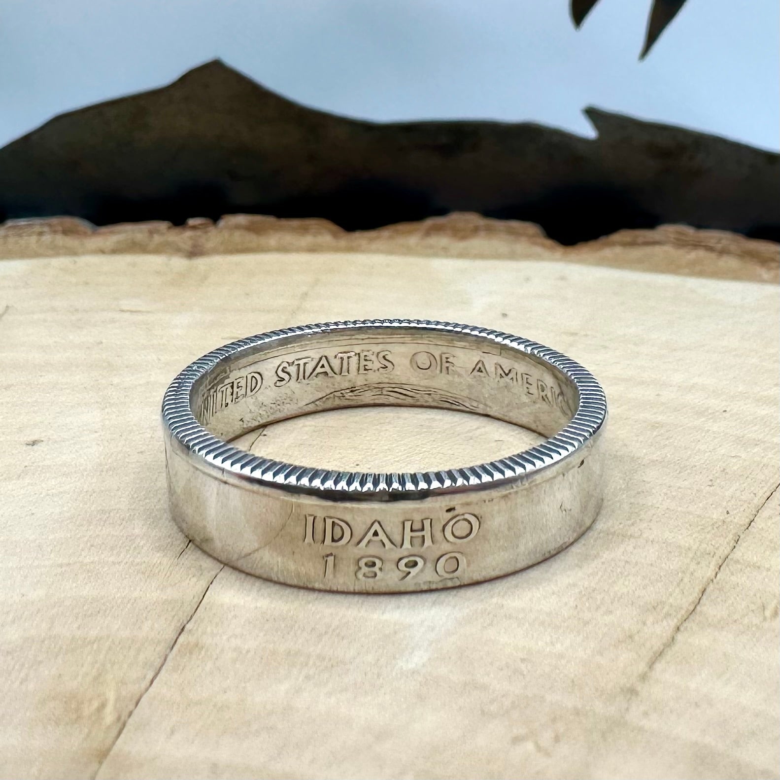 U.S. Silver State Quarter Coin Ring featuring Idaho on a light wood round. - Mountainstruck Coin Jewelry