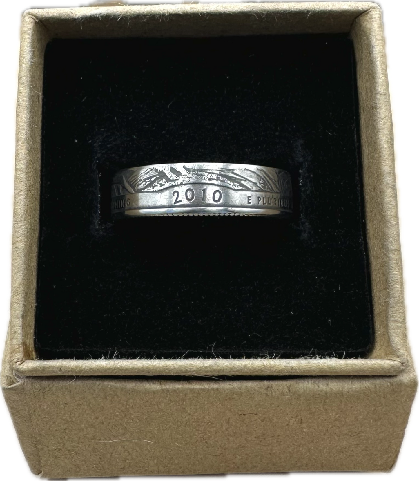 U.S. Yellowstone Quarter Coin Ring in a brown kraft box on a black velvet background. - Mountainstruck Coin Jewelry
