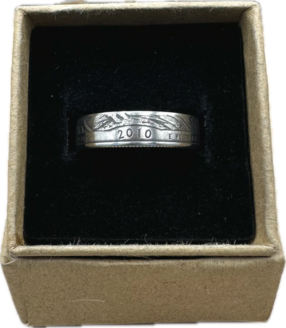 U.S. Yellowstone Quarter Coin Ring in a brown kraft box on a black velvet background. - Mountainstruck Coin Jewelry