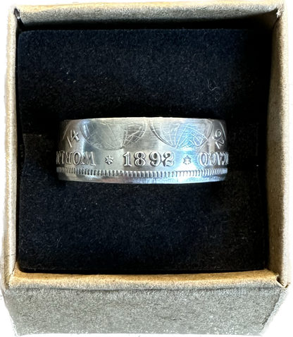 U.S. 1892-1893 Chicago Columbus Silver Half Dollar Coin Ring (shine) in a brown kraft box on a black velvet background. - Mountainstruck Coin Jewelry