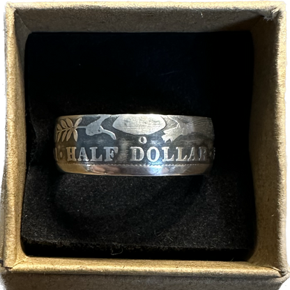 U.S. Barber Half Dollar Silver Coin Ring (reverse) in a brown kraft box on a black velvet background. - Mountainstruck Coin Jewelry
