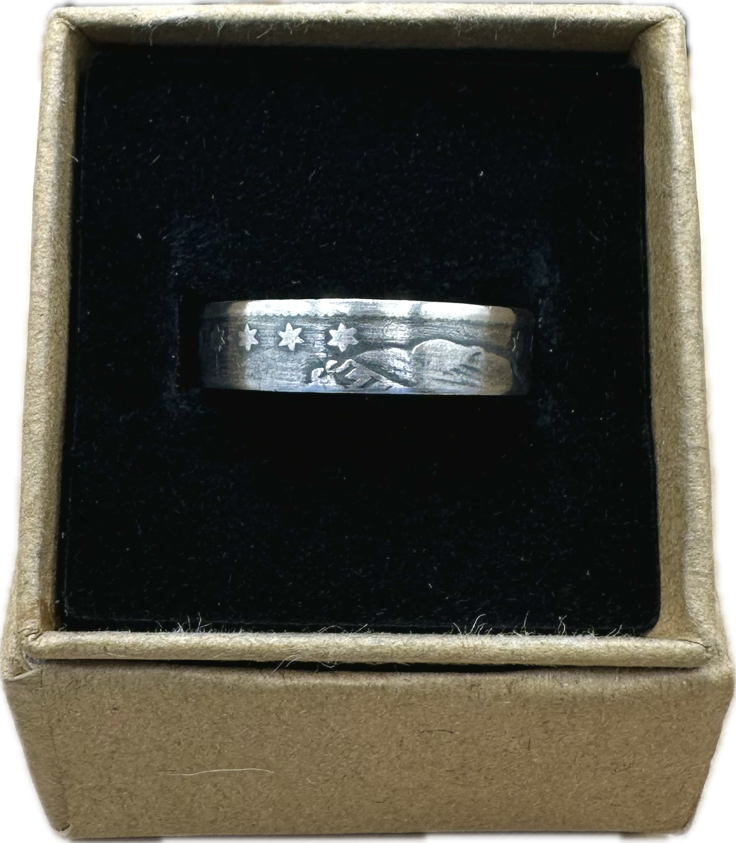 U.S. Capped Bust Liberty Quarter Silver Coin Ring in a brown kraft box on a black velvet background. - Mountainstruck Coin Jewelry