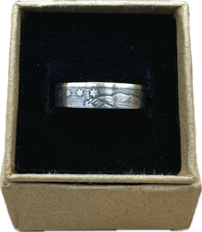 U.S. Capped Bust Liberty Quarter Silver Coin Ring in a brown kraft box on a black velvet background. - Mountainstruck Coin Jewelry