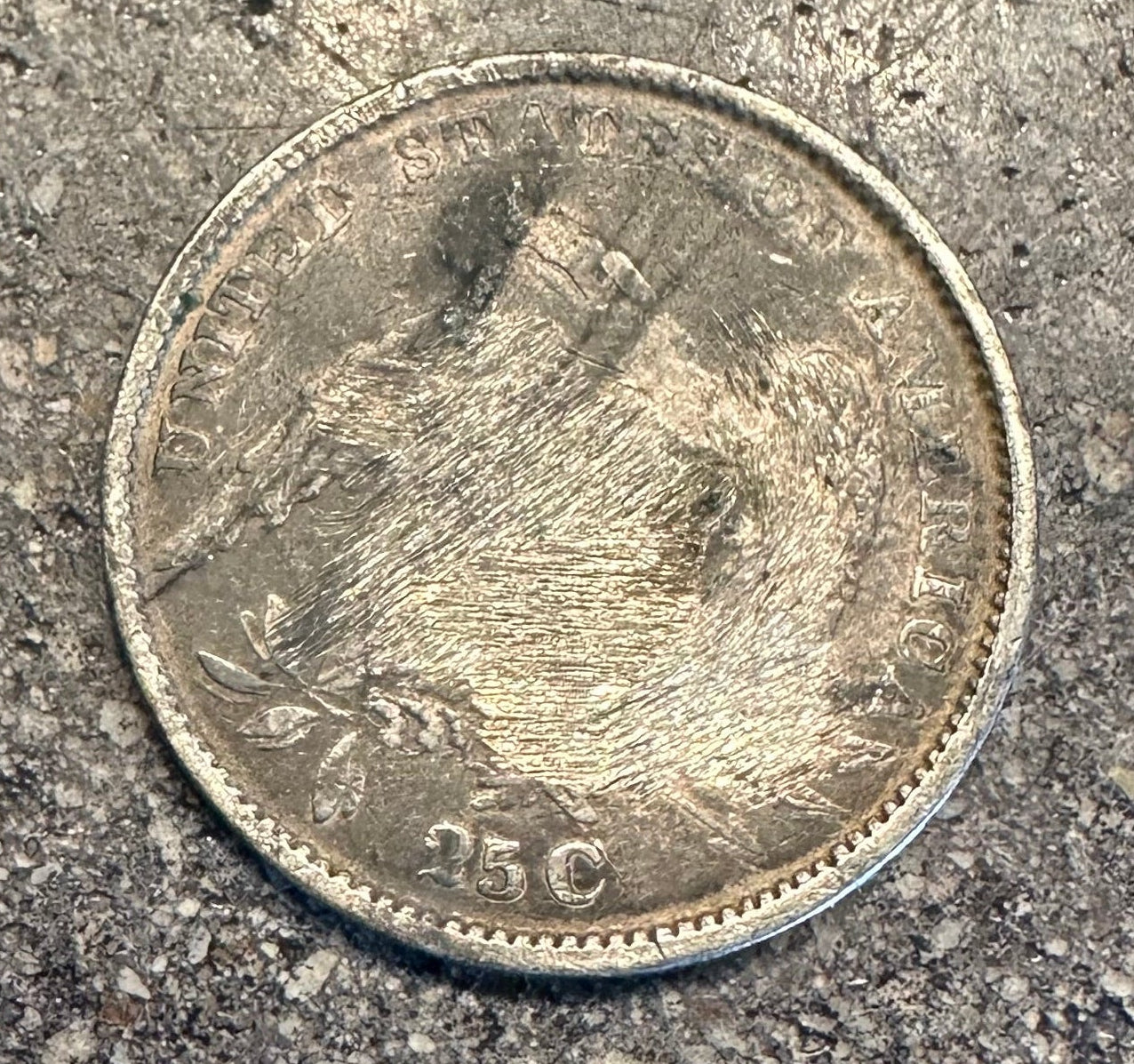 U.S. Capped Bust Liberty Quarter Silver Coin back on a concrete surface. - Mountainstruck Coin Jewelry