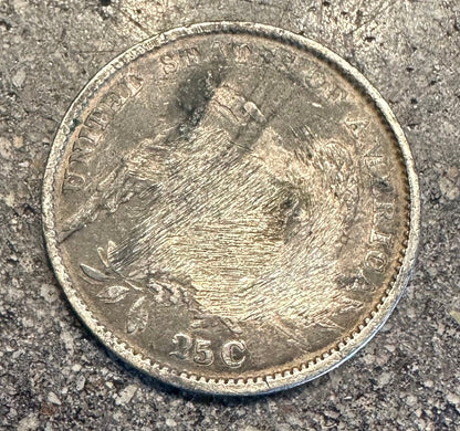 U.S. Capped Bust Liberty Quarter Silver Coin back on a concrete surface. - Mountainstruck Coin Jewelry