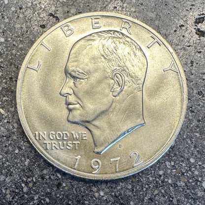 U.S. Eisenhower One Dollar 40% Silver Coin front on a dark concrete background. - Mountainstruck Coin Jewelry