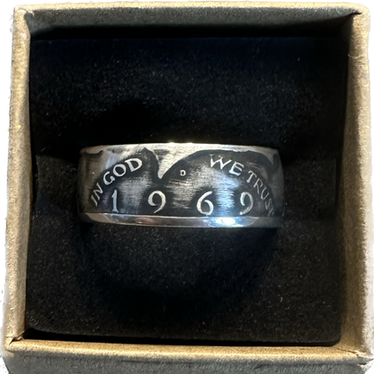 U.S. JFK Silver Half Dollar Coin Ring (front) in a brown kraft box on a black velvet background. - Mountainstruck Coin Jewelry