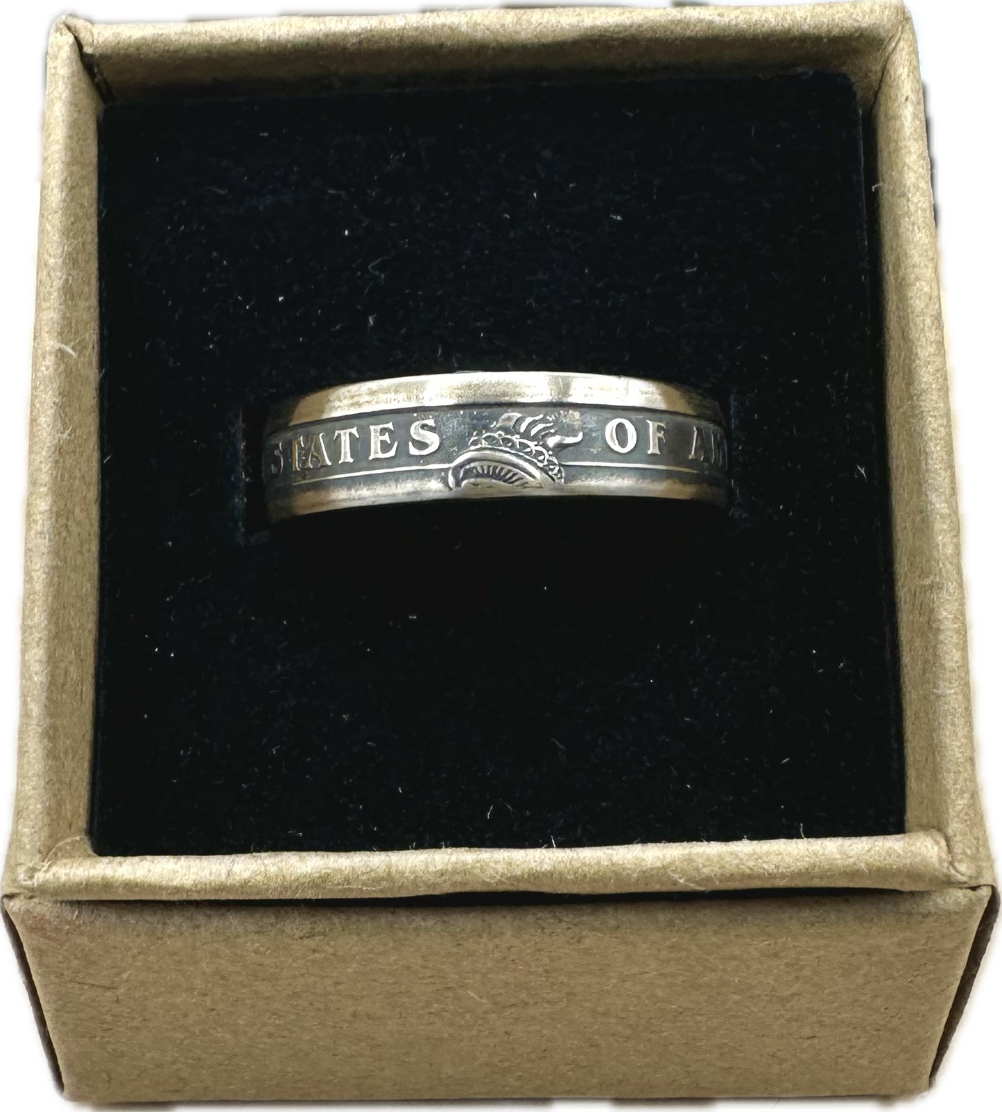 U.S. Presidential Dollar Coin Ring (Reverse) patina in a brown kraft box on a black velvet background. - Mountainstruck Coin Jewelry
