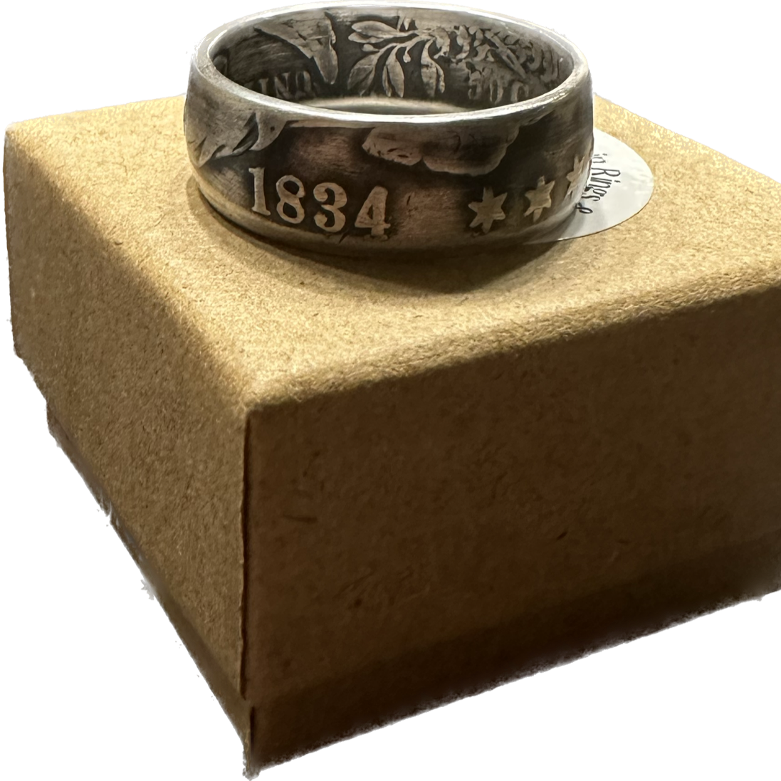 U.S. (Rare) Capped Bust Liberty Silver Half Dollar Coin Ring on a brown kraft box. - Mountainstruck Coin Jewelry