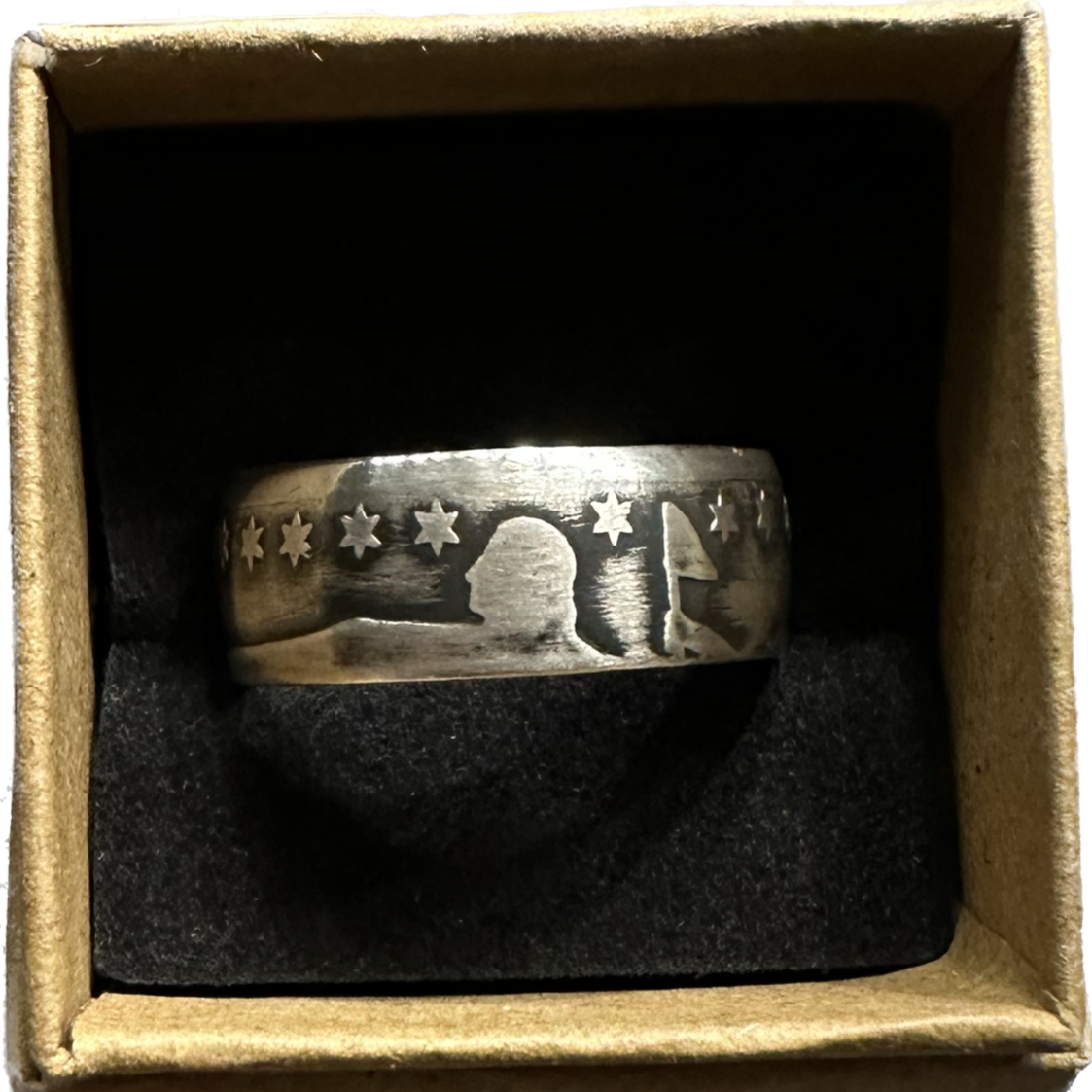 U.S. Seated Liberty Silver Half Dollar Coin Ring (patina) in a brown kraft box on a black velvet background. - Mountainstruck Coin Jewelry