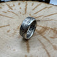 U.S. Seated Liberty Silver Half Dollar Coin Ring (patina) on a light wood round. - Mountainstruck Coin Jewelry