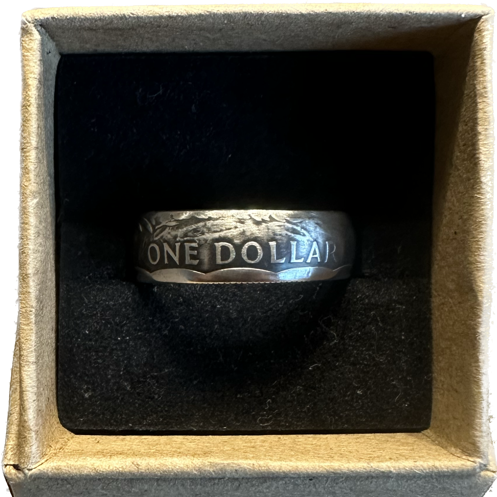 U.S. Susan B. Anthony Dollar Coin Ring in a brown kraft box on a black background. - Mountainstruck Coin Jewelry
