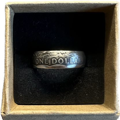 U.S. Susan B. Anthony Dollar Coin Ring in a brown kraft box on a black background. - Mountainstruck Coin Jewelry