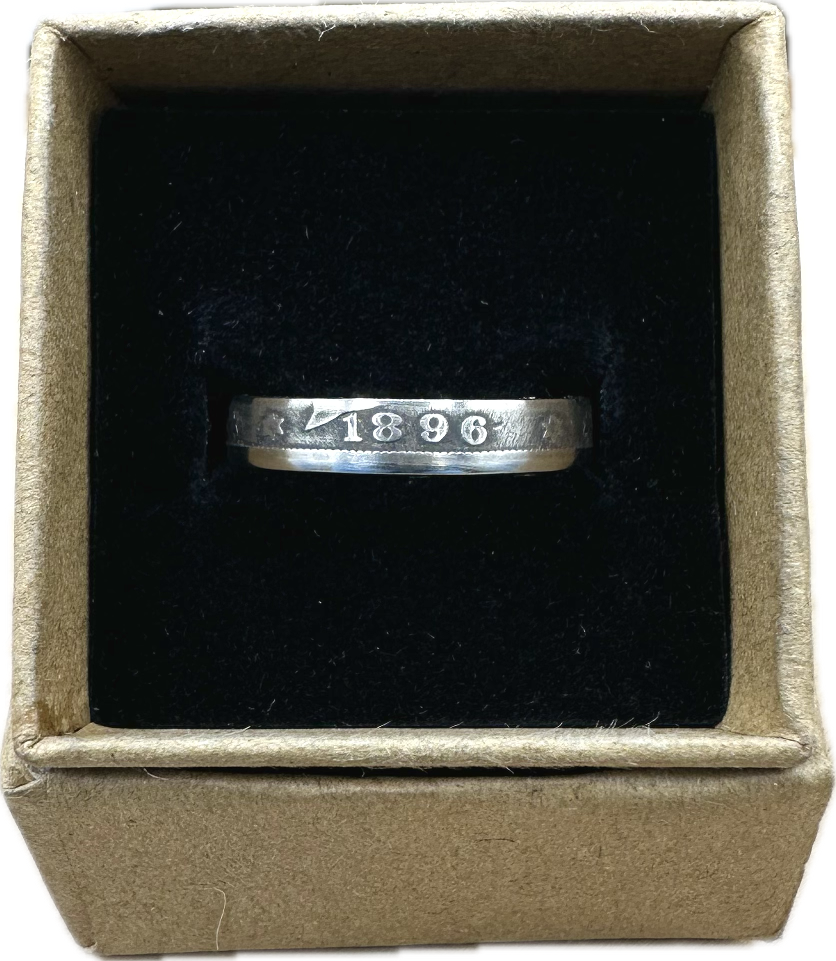 U.S. "V" Nickel Coin Ring in a brown kraft box on black velvet background. - Mountainstruck Coin Jewelry