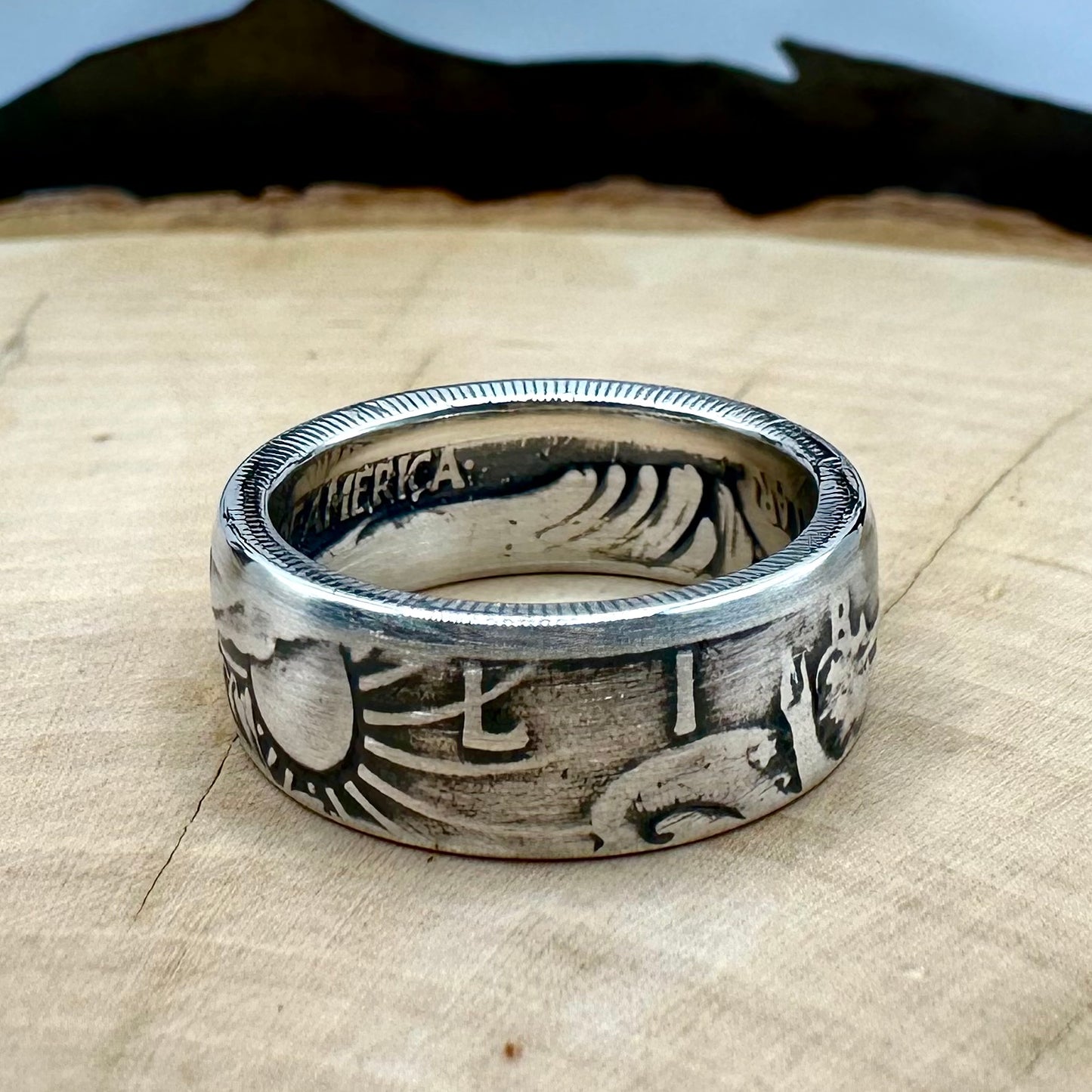 U.S. Walking Liberty Half Dollar Silver Coin Ring size 7 on a light wood round. - Mountainstruck Coin Jewelry