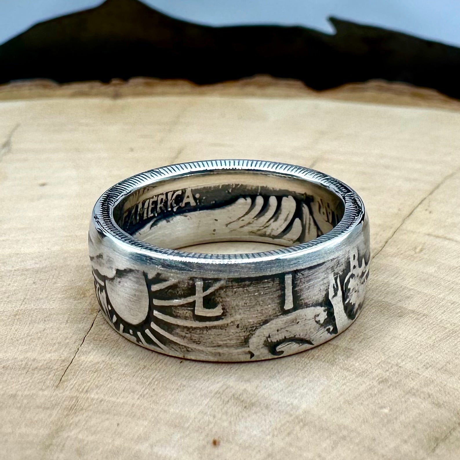 U.S. Walking Liberty Half Dollar Silver Coin Ring size 7 on a light wood round. - Mountainstruck Coin Jewelry