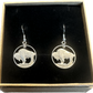 U.S. Buffalo Nickel Coin Earrings in a brown kraft box on a black velvet background.