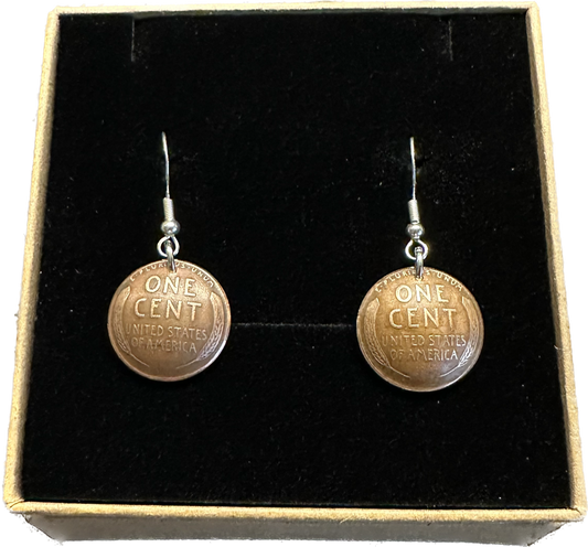 Wheat Penny Domed Coin  Earrings in a brown kraft box on a black velvet background.