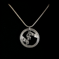 U.S. Saratoga British Surrender Hand Cut Coin Necklace on black velvet background.