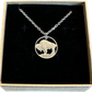 U.S. Buffalo Nickel (Reverse) Coin Necklace with a stainless chain in a brown kraft box on a black velvet background.