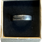 WW2 U.S. Silver Nickel Coin Ring in a brown kraft box on a black velvet background.