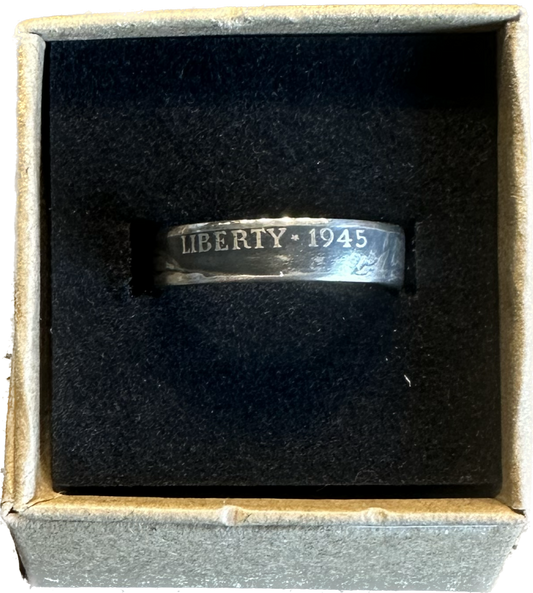 WW2 U.S. Silver Nickel Coin Ring in a brown kraft box on a black velvet background.
