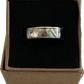U.S. Silver State Quarter Coin Ring featuring Idaho in a brown kraft box on a black velvet background.