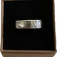 U.S. Silver State Quarter Coin Ring featuring Washington in a brown kraft box on a black velvet background.