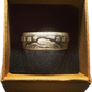 (Rare) Capped Bust Liberty Silver Half Dollar Coin Ring in brown kraft box with black velvet background.