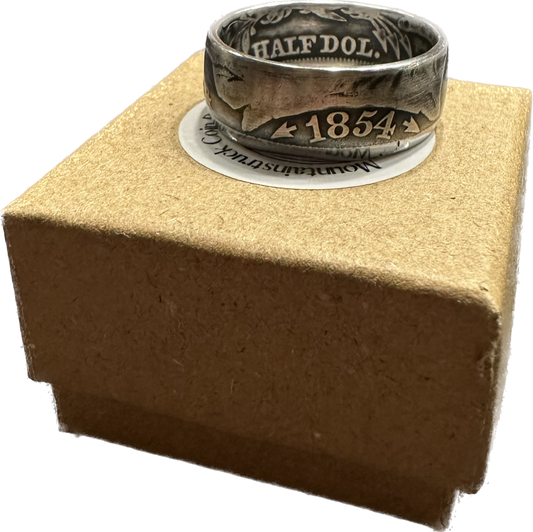 Seated Liberty Silver Half Dollar Coin Ring on a brown kraft box.