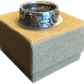 Walking Liberty Silver Half Dollar Coin Ring on a brown kraft box.