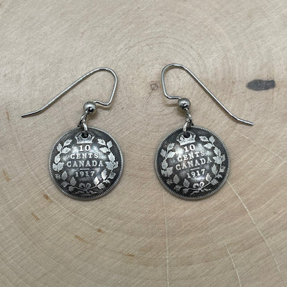 Canada 10 Cents Silver Coin Earrings on a light wood round. - Mountainstruck Coin Jewelry