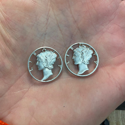 U.S. Mercury Dime Silver Hand Cut Coins in a hand. - Mountainstruck Coin Jewelry