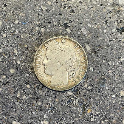 France 1 Franc Silver coin front on a concrete background. - Mountainstruck Coin Jewelry