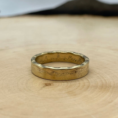 Mexico 50 Centavos Coin Ring on a light wood round. - Mountainstruck Coin Jewelry